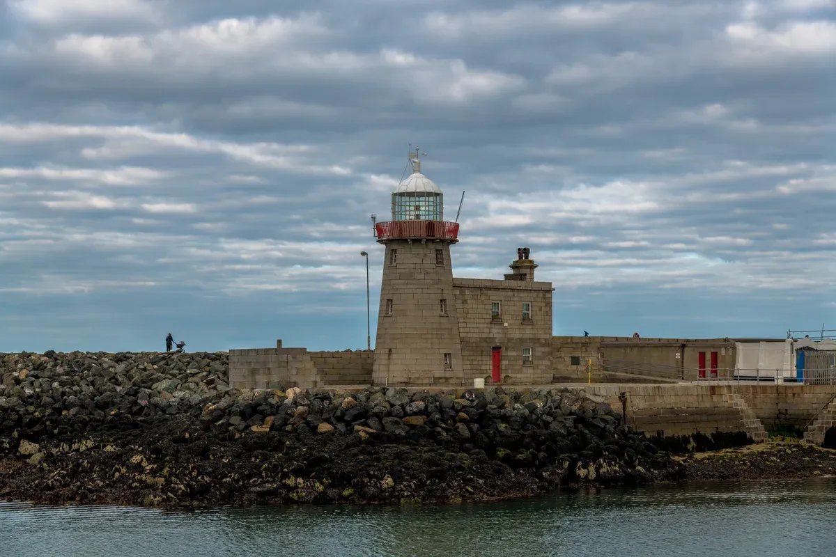 Howth harbour lighthouse on a vacation tours of Ireland day trip from Dublin