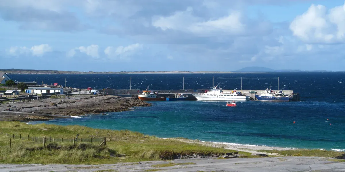 The harbour and village bay on Inis Oírr on a vacation tours of Ireland Aran Islands stop
